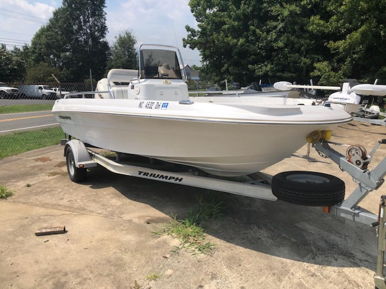 2007 Triumph 190 bay with evinrude 115hp and trailer Merritt Marine